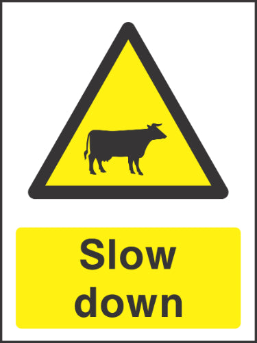 Slow Down Cattle Sign