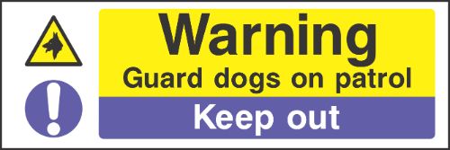 Warning guard dogs on patrol Sign