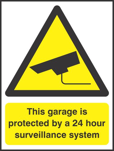 This garage is protected by a 24 hour serveillance system Sign