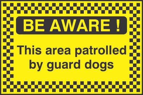 Be aware this area patrolled by guard dogs Sign